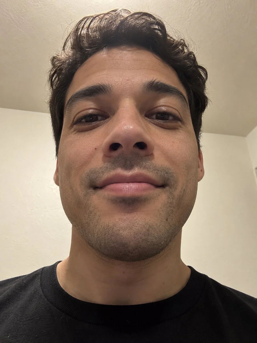 AI-generated portrait with the phone held low and close, scored 83